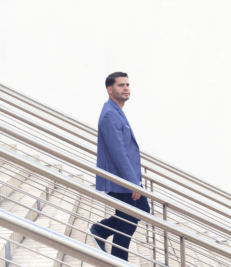 man walking down stairs 2