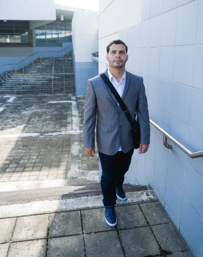 photo of man walking up stairs 1