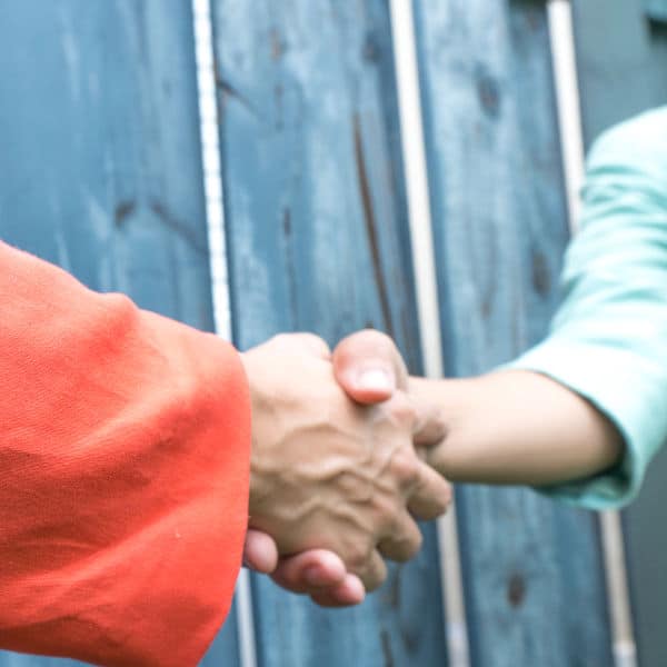women shaking hands