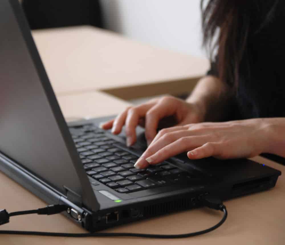 young woman with laptop